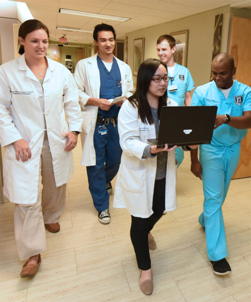 Residents walking down the hallway