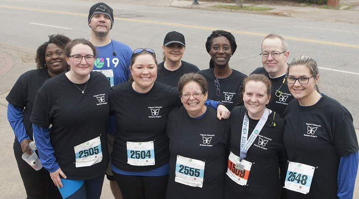 Bariatric patients gather for a group photo during the race event